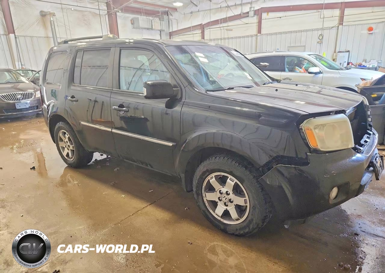 2011 Honda Pilot Touring VIN:5FNYF4H95BB075826 - 4