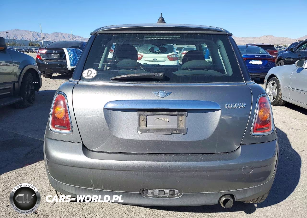 2010 Mini Cooper VIN:WMWMF3C5XATZ23379 - 6