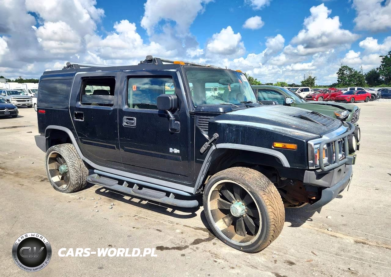 2003 Hummer H2 VIN:5GRGN23UX3H101352 - 4