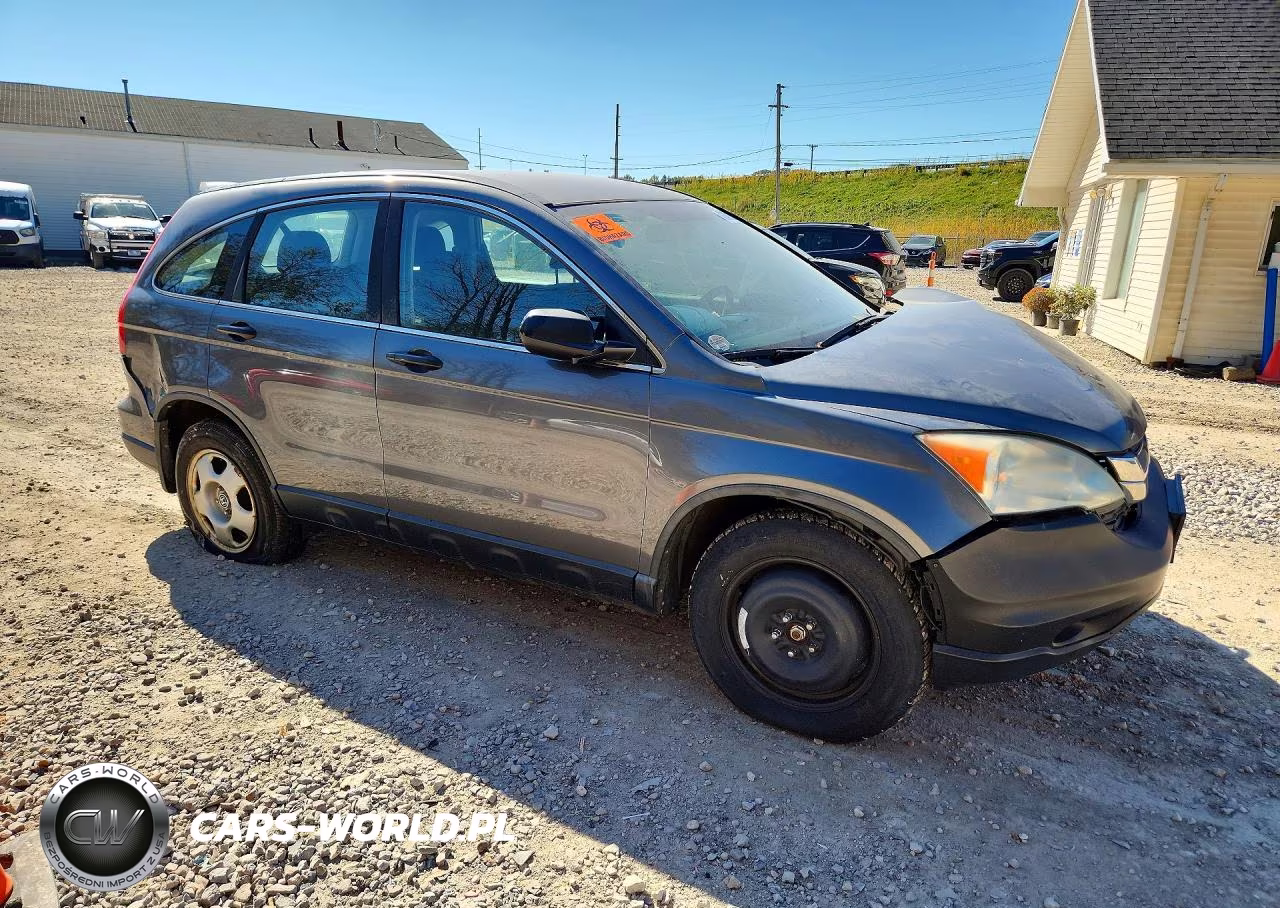 2011 Honda Cr-V Lx VIN:5J6RE4H34BL030872 - 4