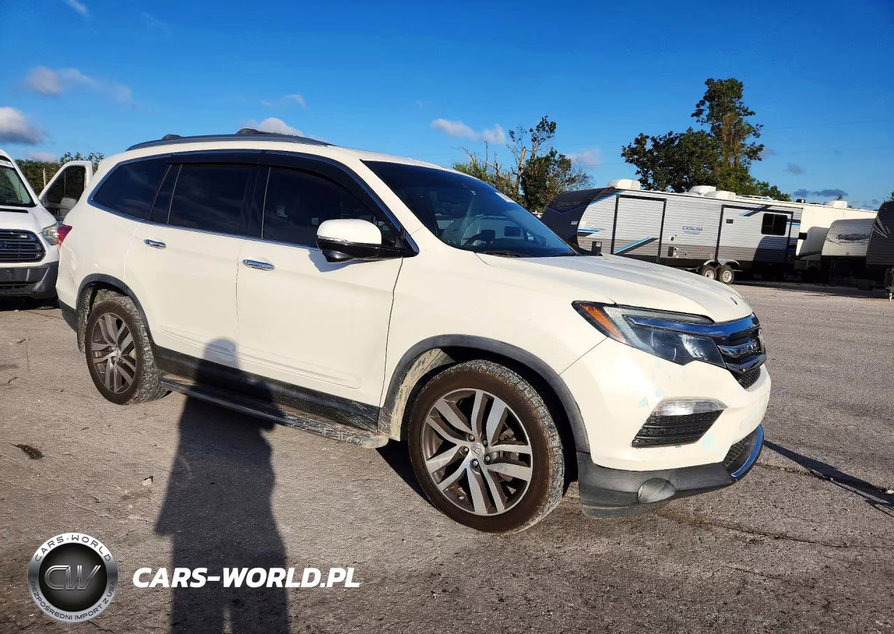 2016 Honda Pilot Touring VIN:5FNYF5H91GB040181 - 4
