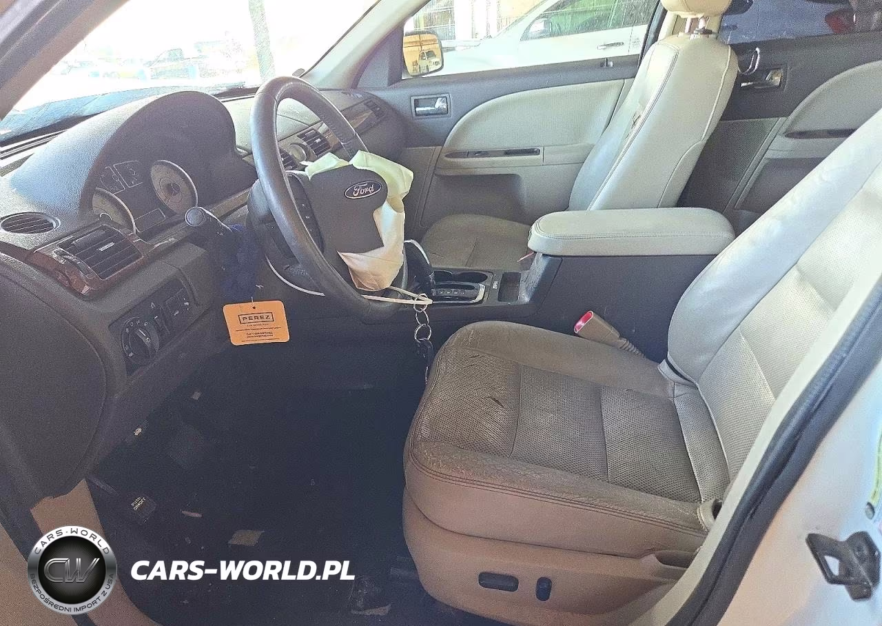 2009 Ford Taurus Limited VIN:1FAHP25W89G118590 - 7