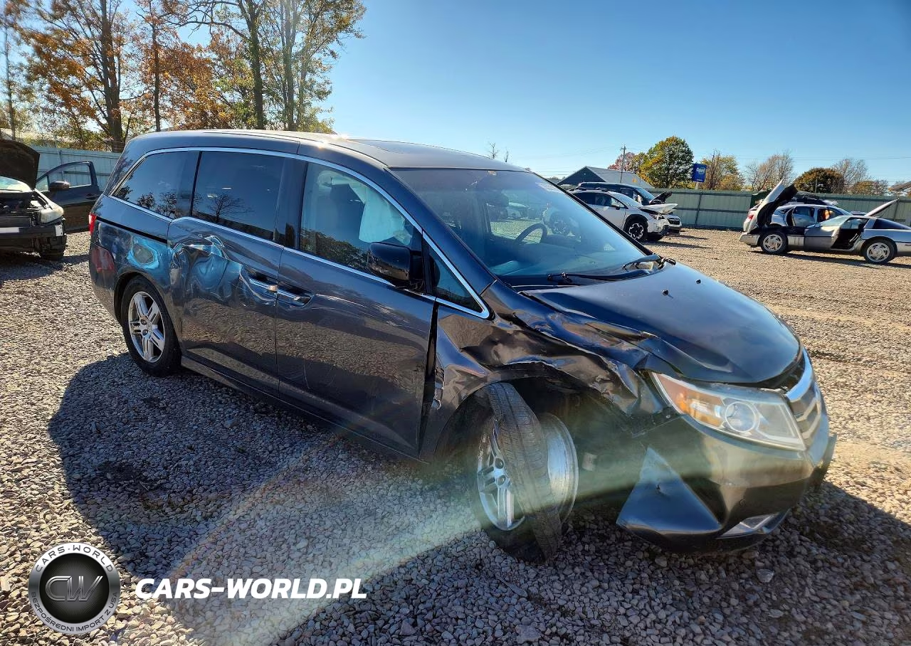 2012 Honda Odyssey Touring VIN:5FNRL5H97CB007080 - 4
