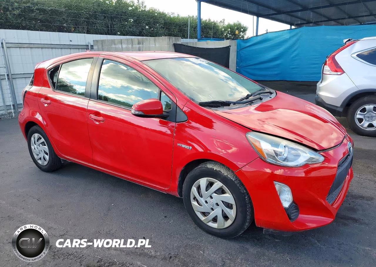 2015 Toyota Prius C One VIN:JTDKDTB33F1104443 - 4