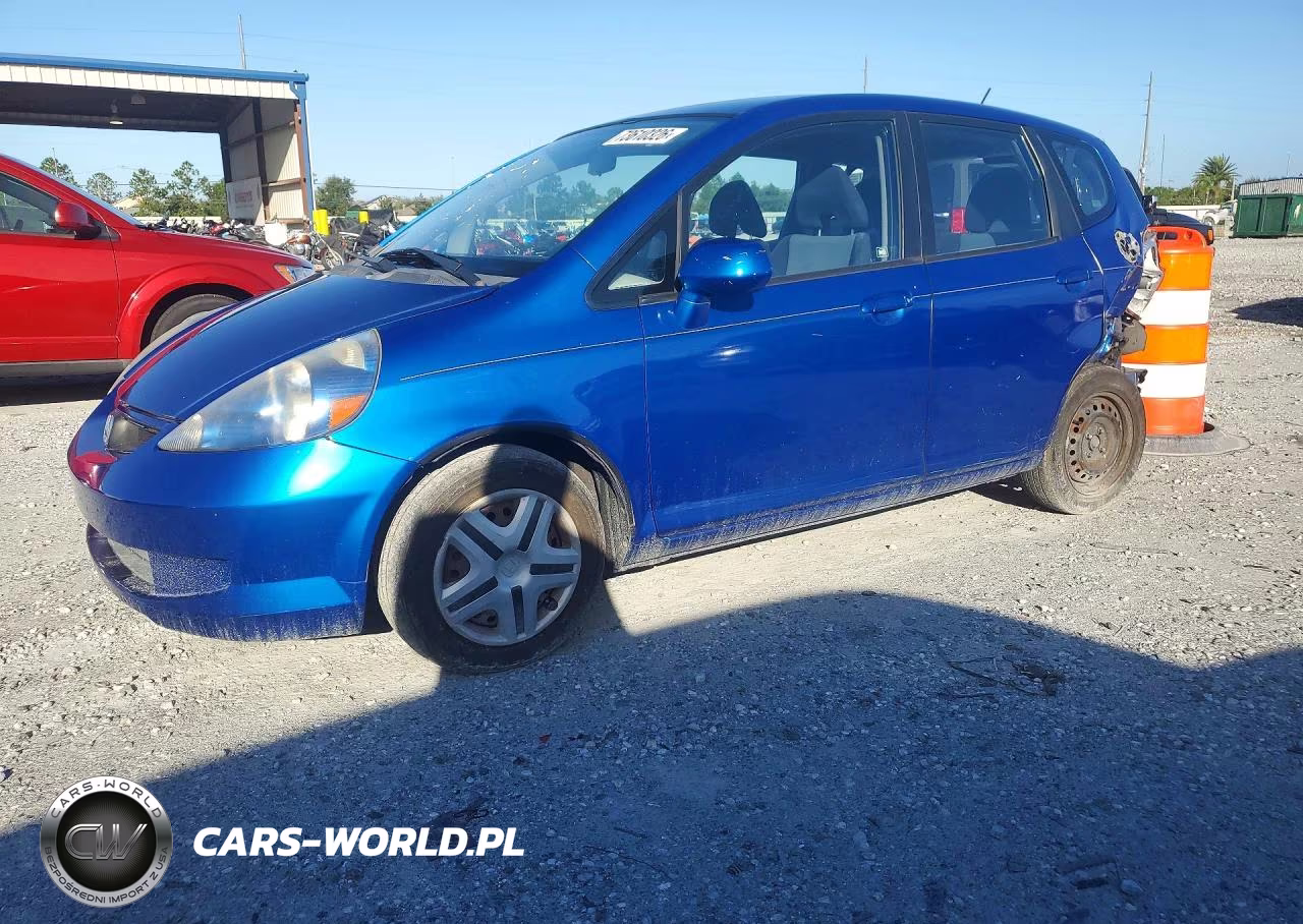 2007 Honda Fit VIN:JHMGD38487S053621 - 1