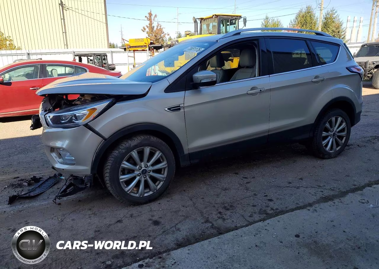 2017 Ford Escape Titanium VIN:1FMCU9J97HUE25816 - 1
