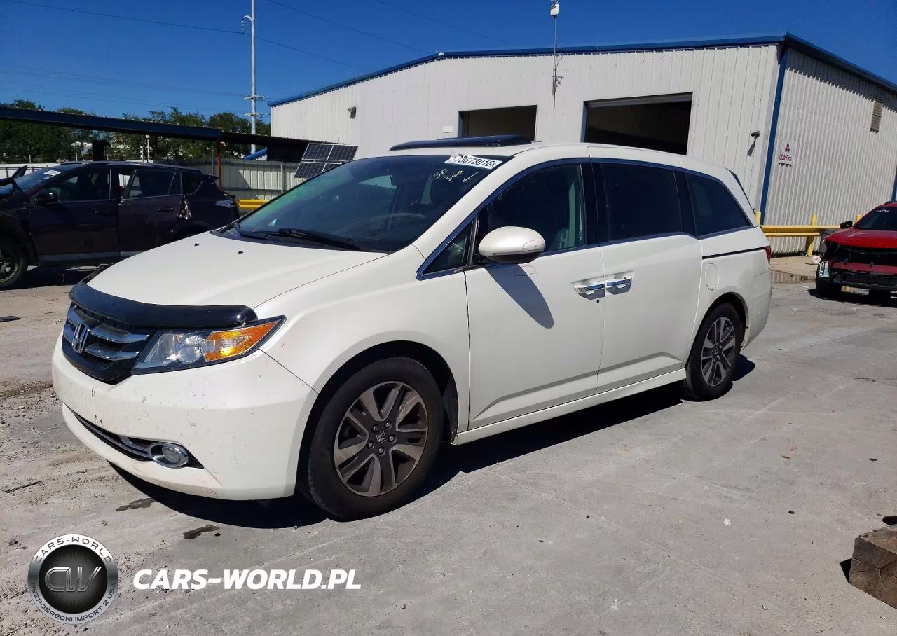 2016 Honda Odyssey Touring VIN:5FNRL5H94GB027714 - 1
