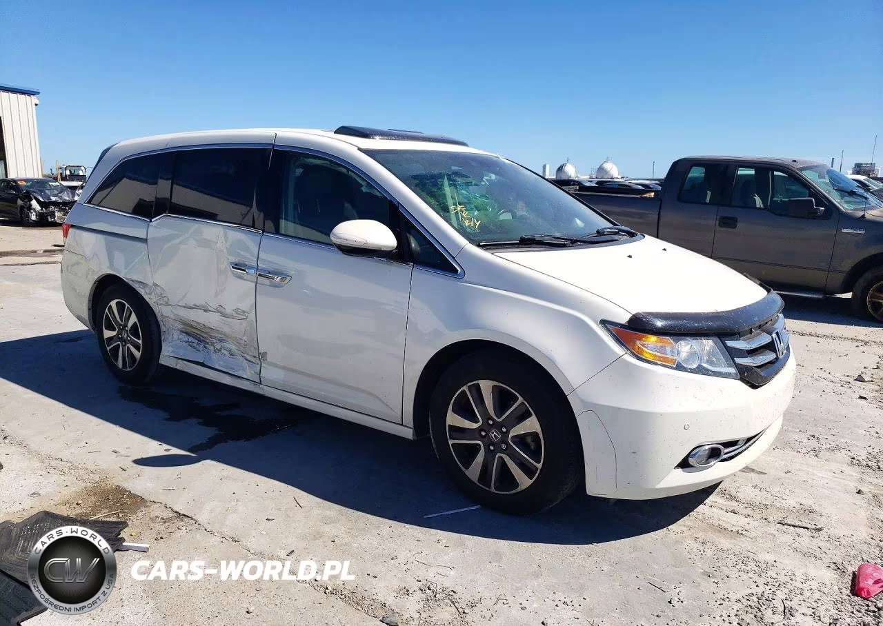 2016 Honda Odyssey Touring VIN:5FNRL5H94GB027714 - 4