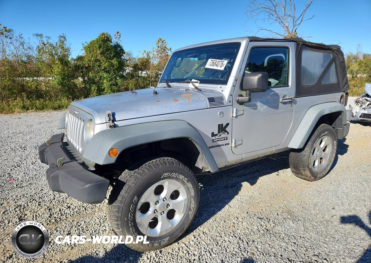 2011 Jeep Wrangler Sport VIN:1J4AA2D13BL541698 - 1