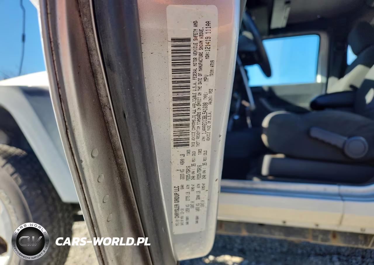 2011 Jeep Wrangler Sport VIN:1J4AA2D13BL541698 - 12