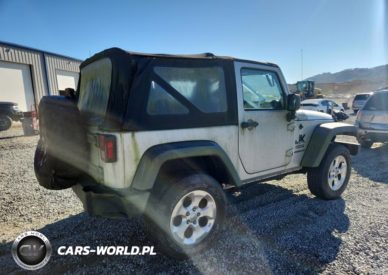 2011 Jeep Wrangler Sport VIN:1J4AA2D13BL541698 - 3