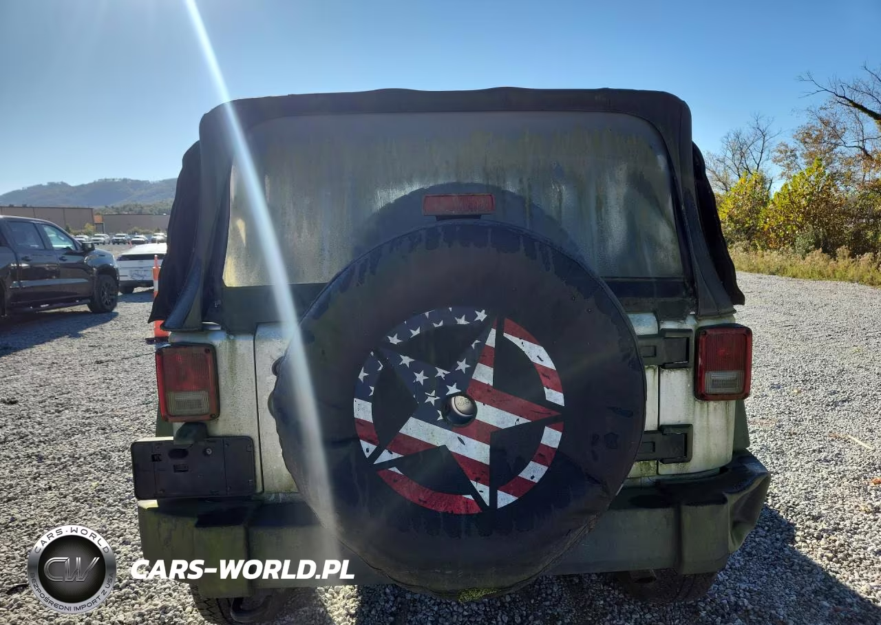 2011 Jeep Wrangler Sport VIN:1J4AA2D13BL541698 - 6