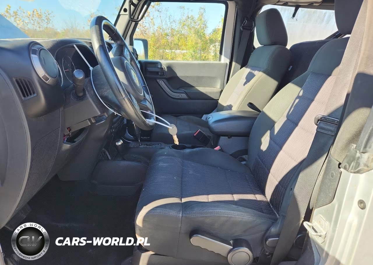 2011 Jeep Wrangler Sport VIN:1J4AA2D13BL541698 - 7