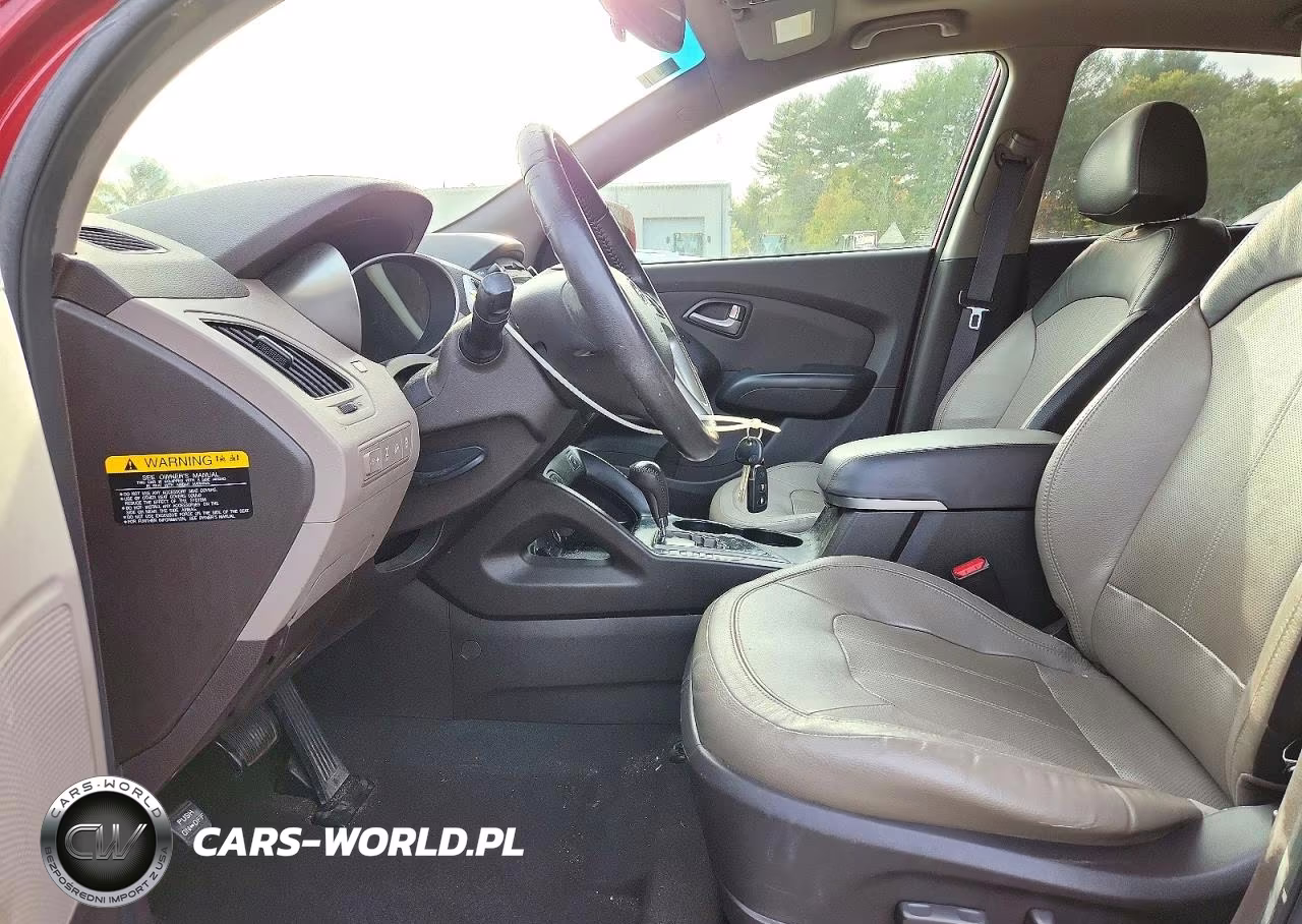 2012 Hyundai Tucson Limited VIN:KM8JUCAC7CU381485 - 7
