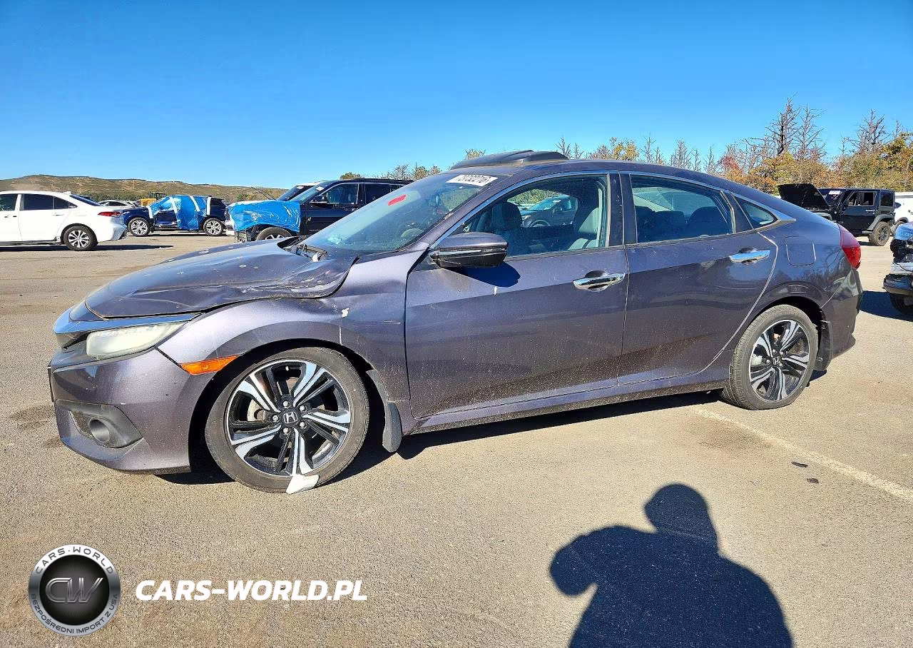 2016 Honda Civic Touring VIN:2HGFC1F94GH633282 - 1