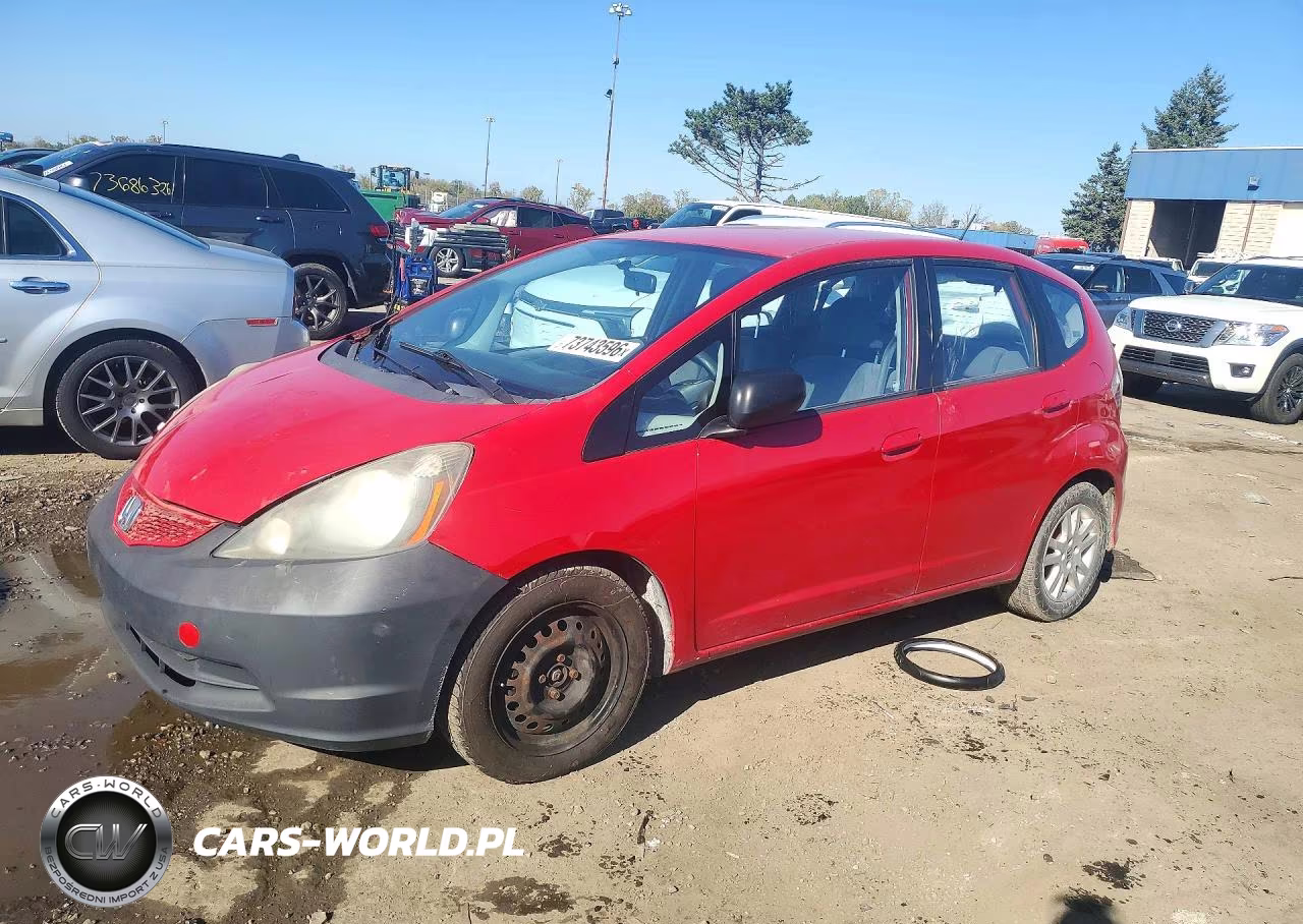 2009 Honda Fit VIN:JHMGE88229S059796 - 1