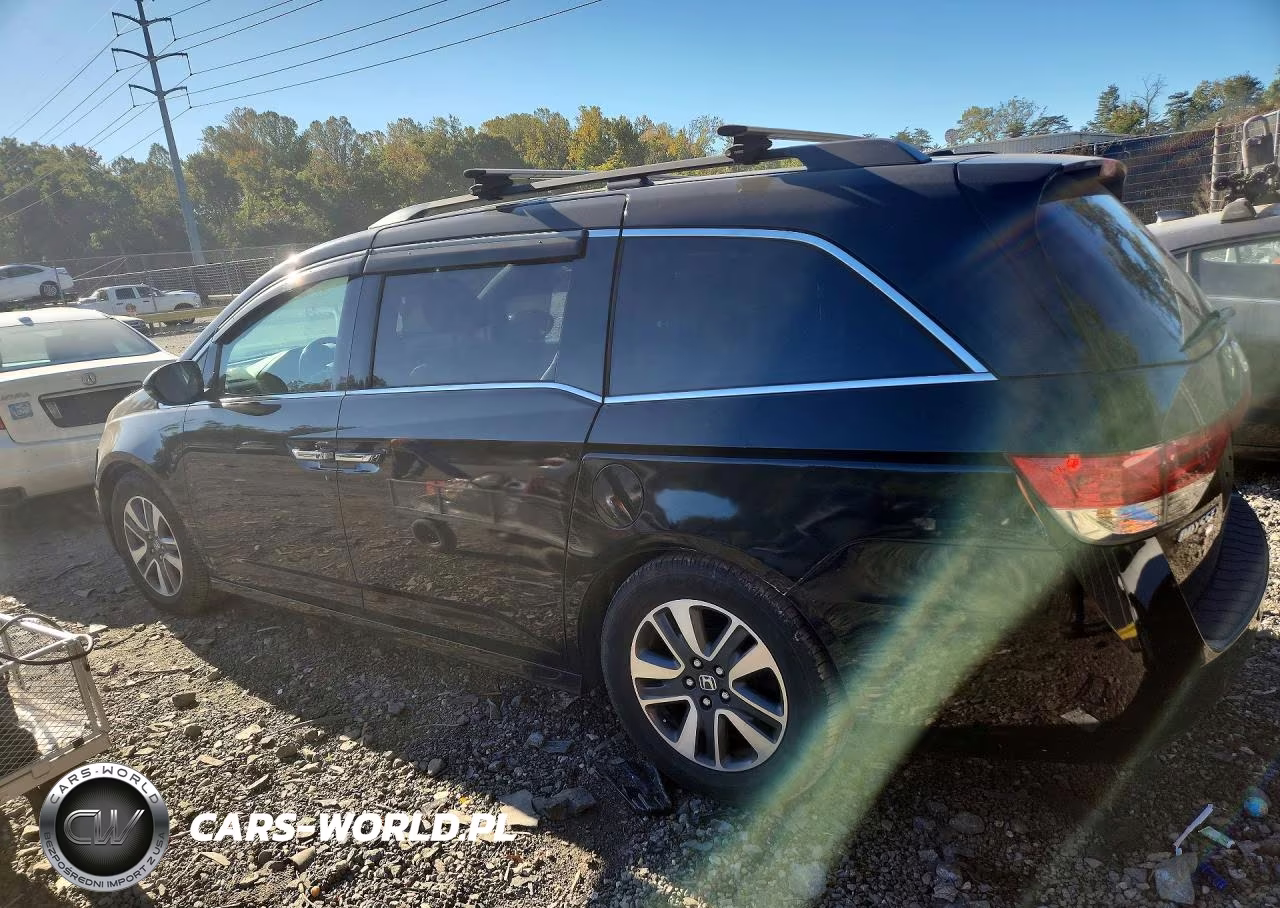 2016 Honda Odyssey Touring VIN:5FNRL5H90GB034126 - 2