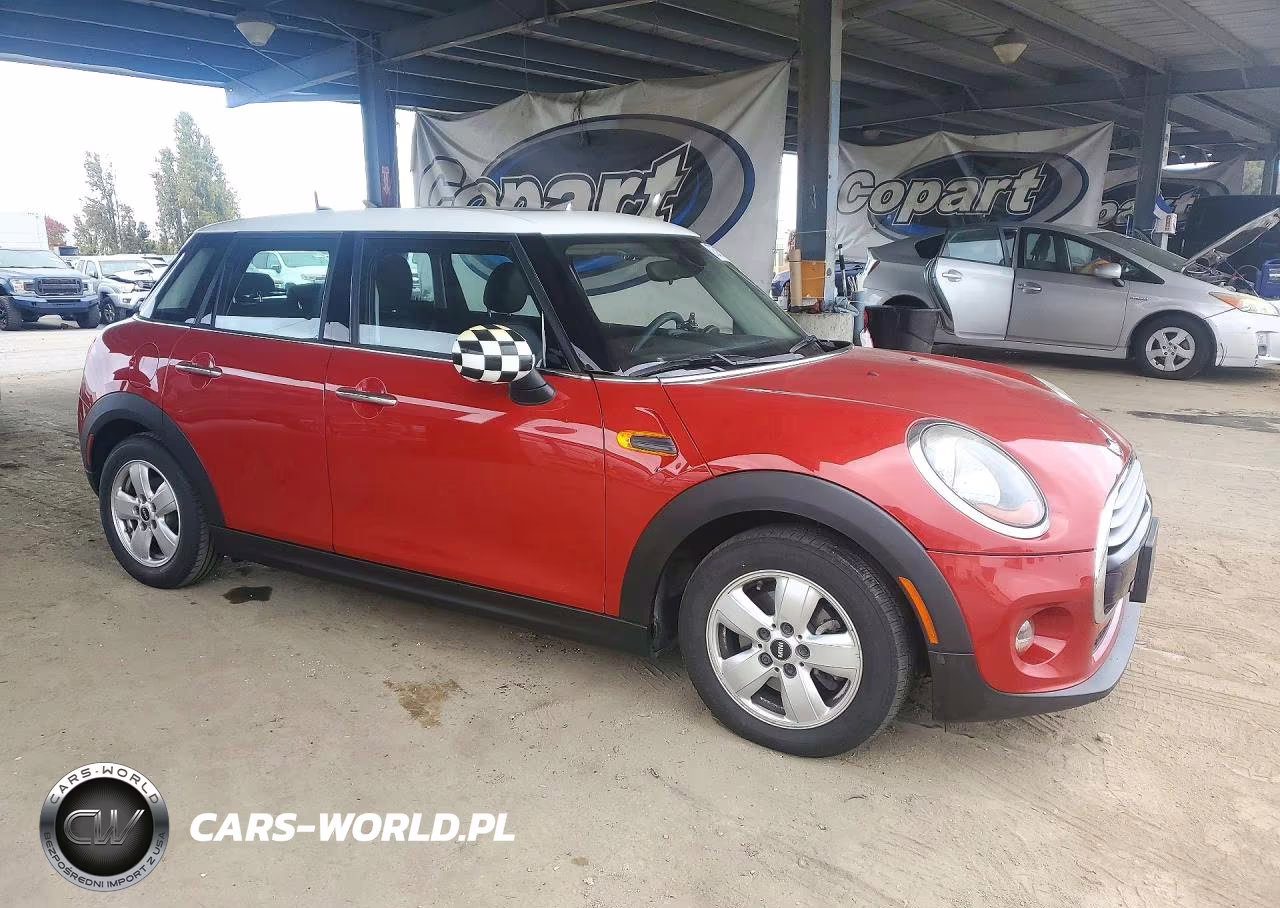 2015 Mini Cooper VIN:WMWXS5C59FT827934 - 4