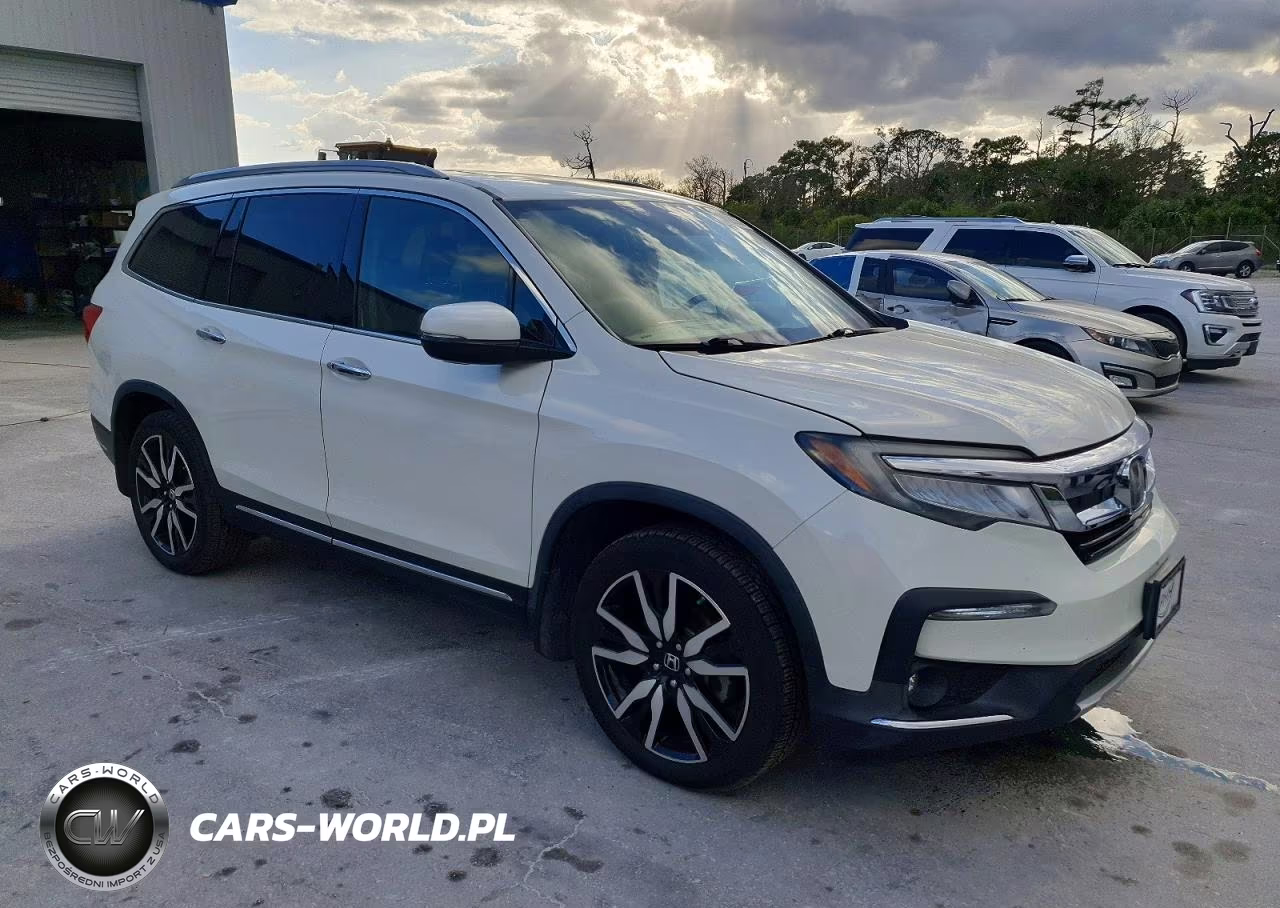 2019 Honda Pilot Touring VIN:5FNYF5H69KB000851 - 4