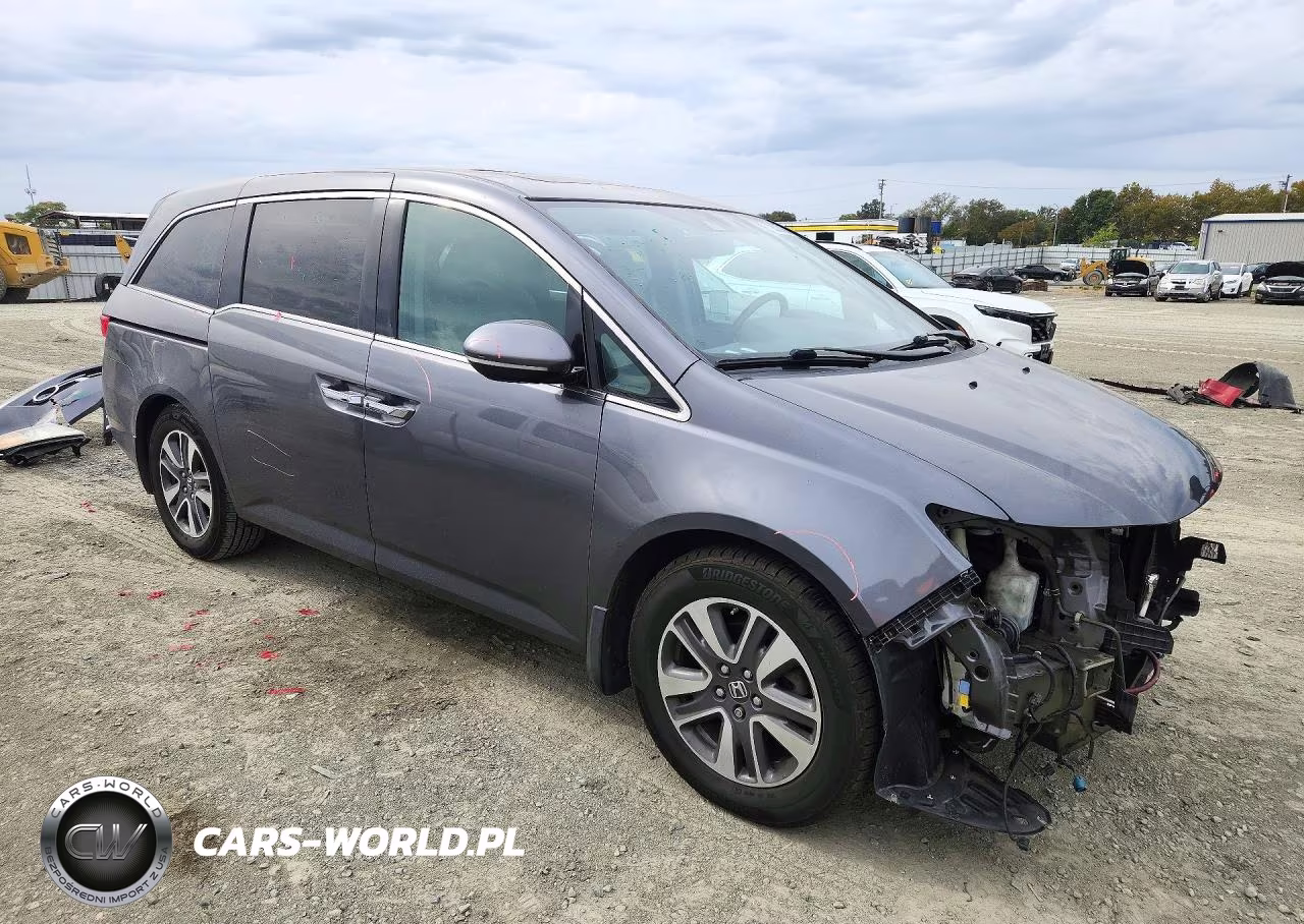 2017 Honda Odyssey Touring VIN:5FNRL5H99HB019142 - 4