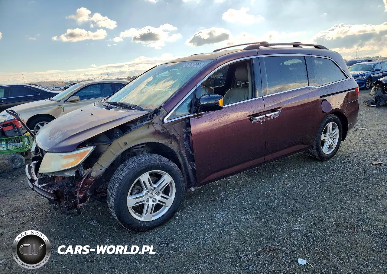 2012 Honda Odyssey Touring VIN:5FNRL5H92CB030511 - 1