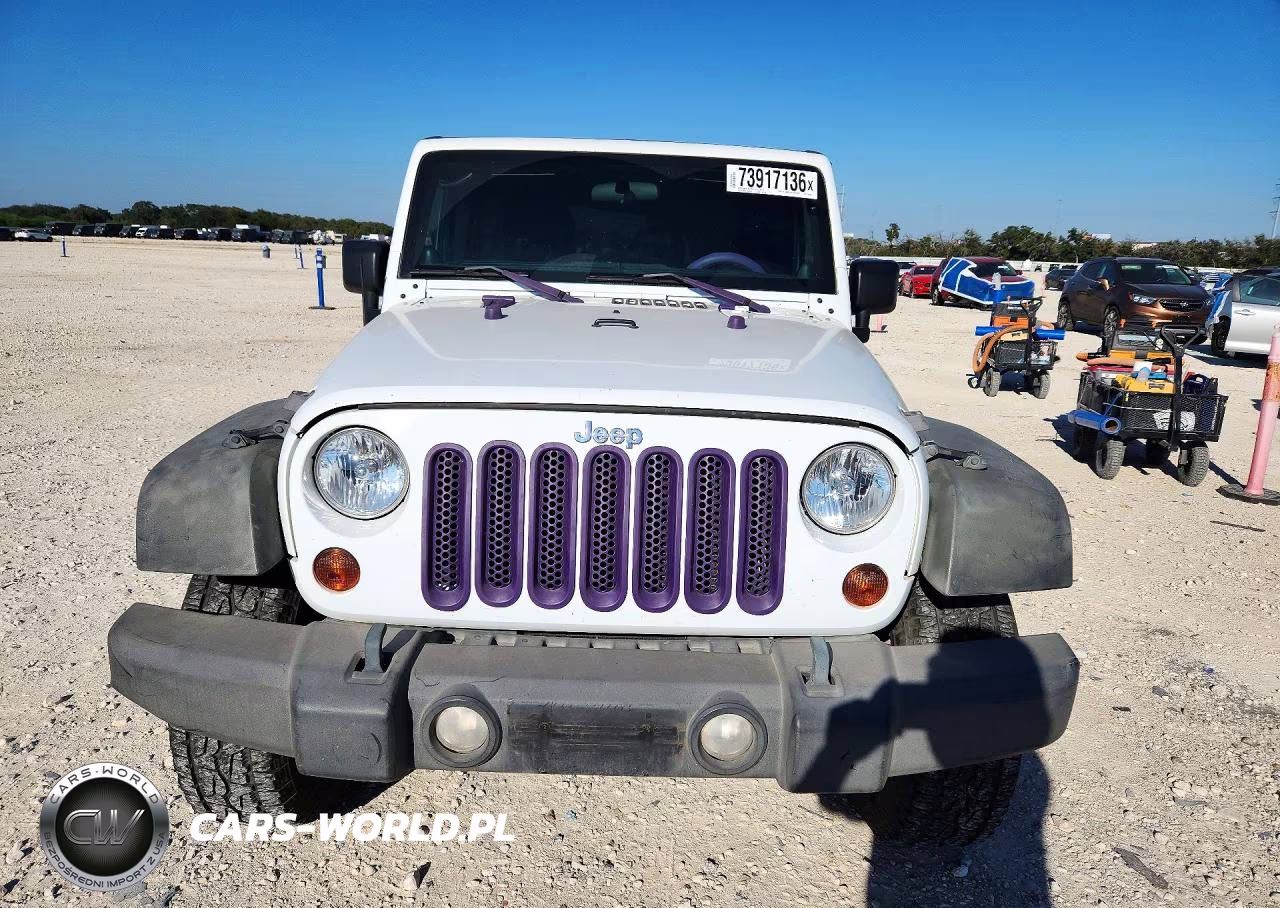 2011 Jeep Wrangler Unlimited Rubicon VIN:1J4BA6H13BL584489 - 5