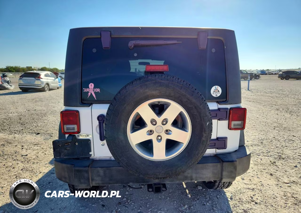 2011 Jeep Wrangler Unlimited Rubicon VIN:1J4BA6H13BL584489 - 6