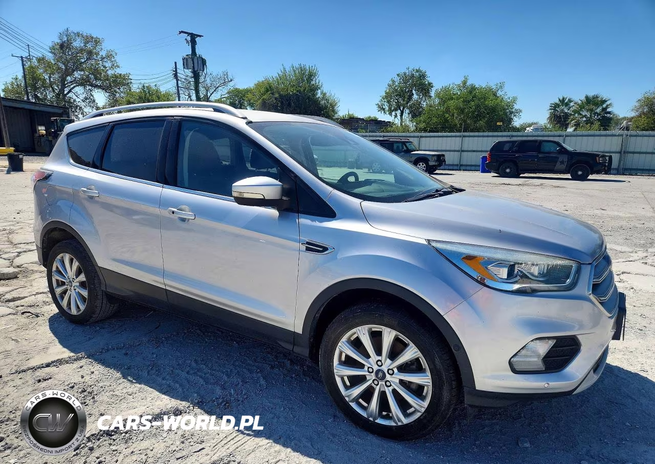 2017 Ford Escape Titanium VIN:1FMCU9JD7HUA69226 - 4