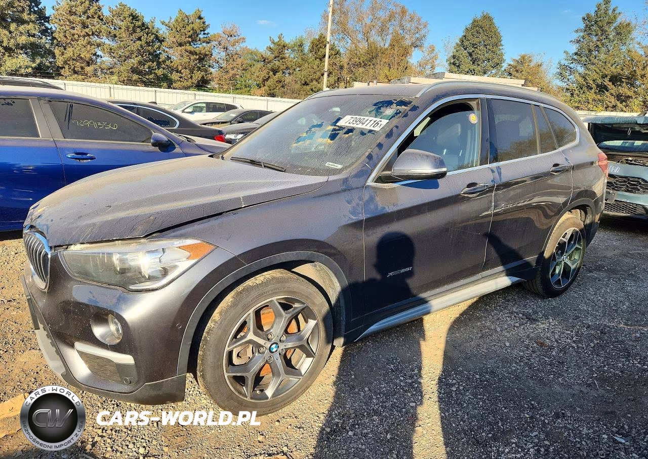 2018 BMW X1 xDrive28I VIN:WBXHT3Z38J4A65977 - 1