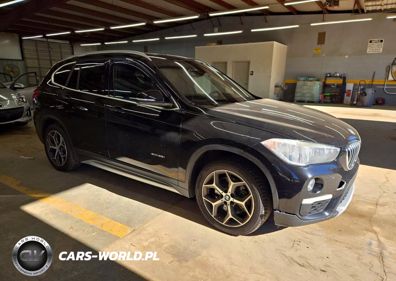 2018 BMW X1 xDrive28I VIN:WBXHT3C32J5K31586 - 4