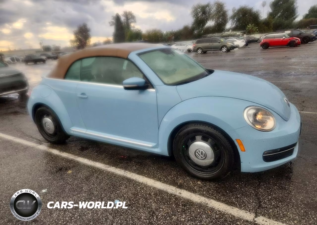 2014 Volkswagen Beetle VIN:3VW5L7AT4EM818928 - 4