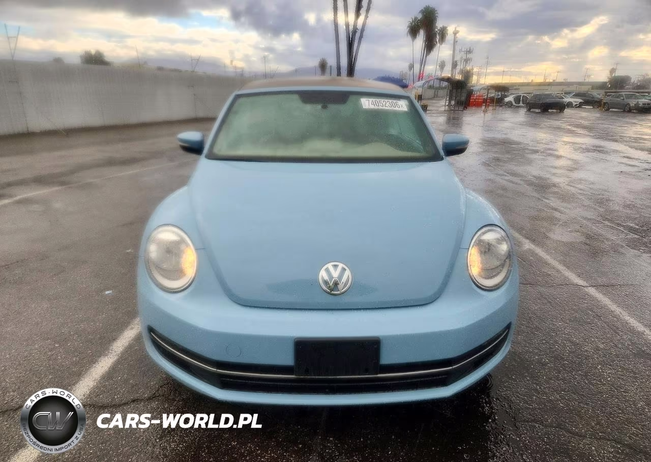 2014 Volkswagen Beetle VIN:3VW5L7AT4EM818928 - 5