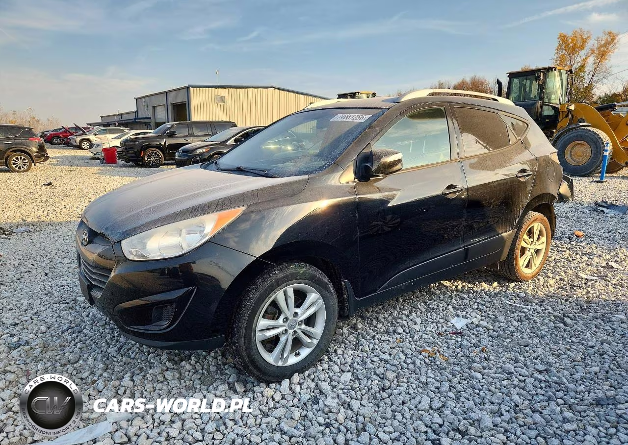 2012 Hyundai Tucson Gls VIN:KM8JUCAC5CU341194 - 1