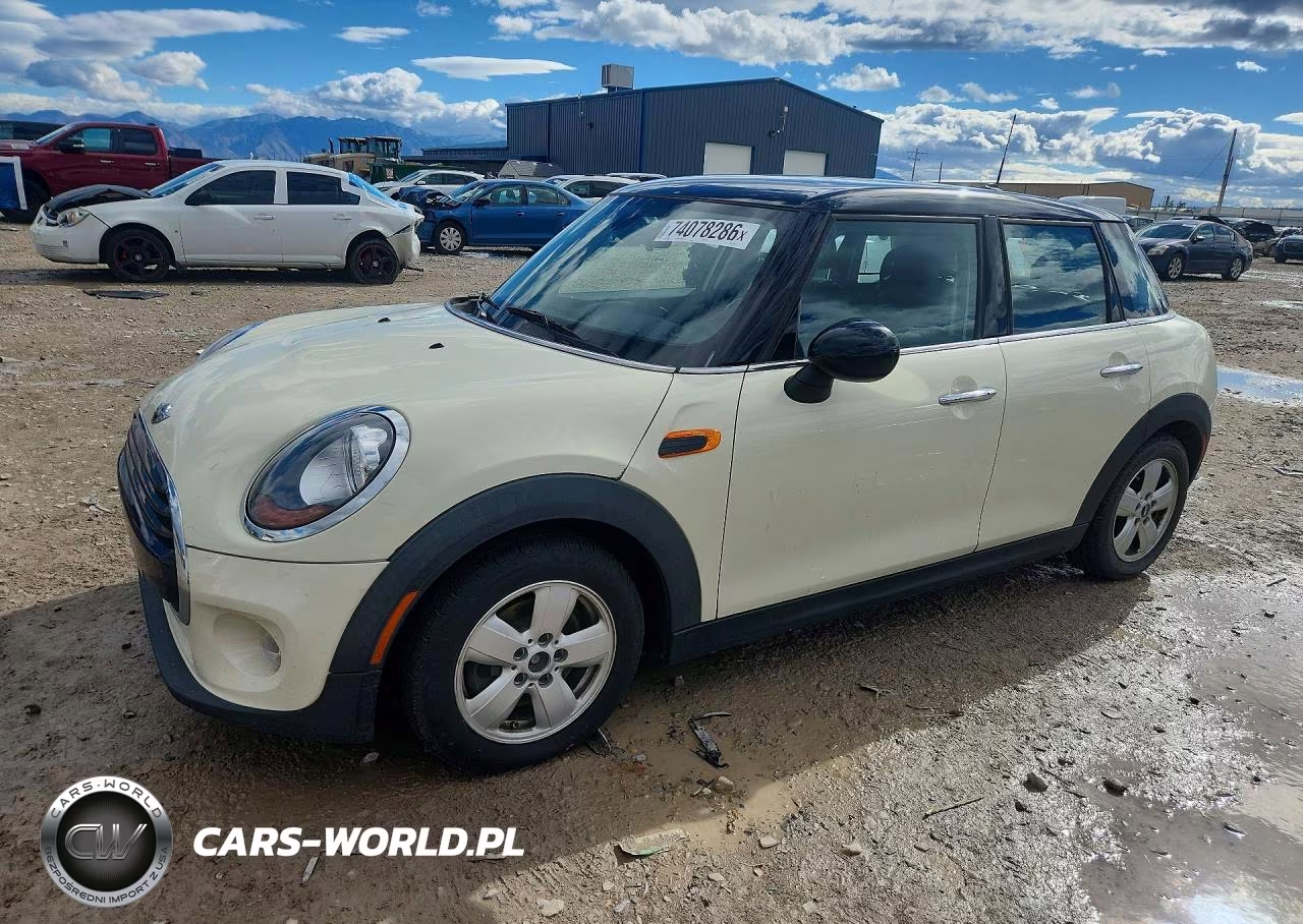 2016 Mini Cooper VIN:WMWXU1C5XG2D12552 - 1