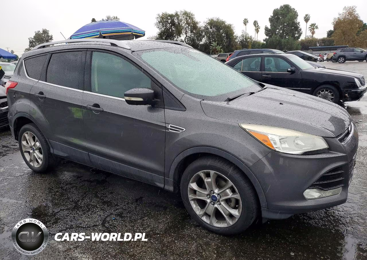 2015 Ford Escape Titanium VIN:1FMCU0JX8FUB40811 - 4
