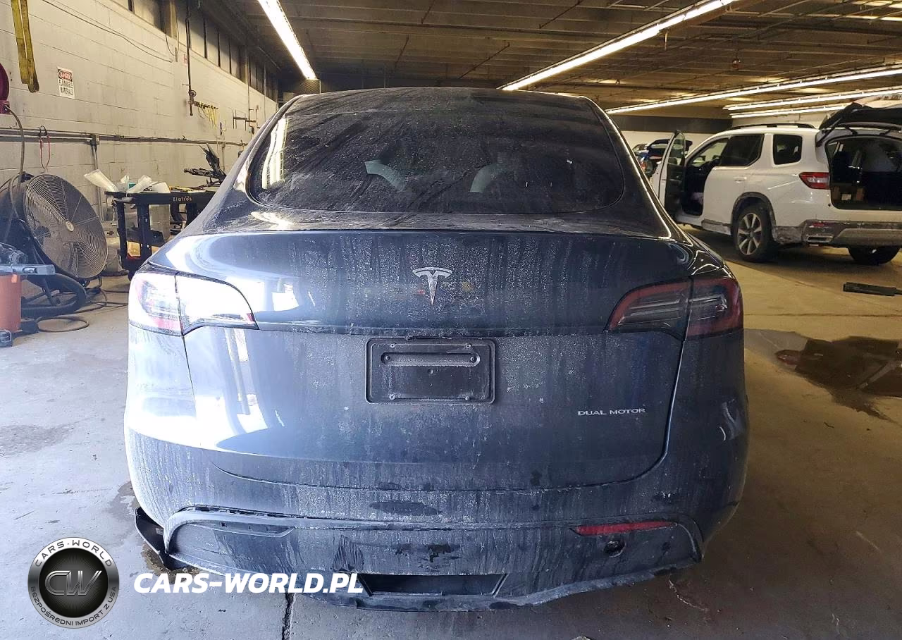 2023 Tesla Model Y VIN:7SAYGAEE0PF967148 - 6