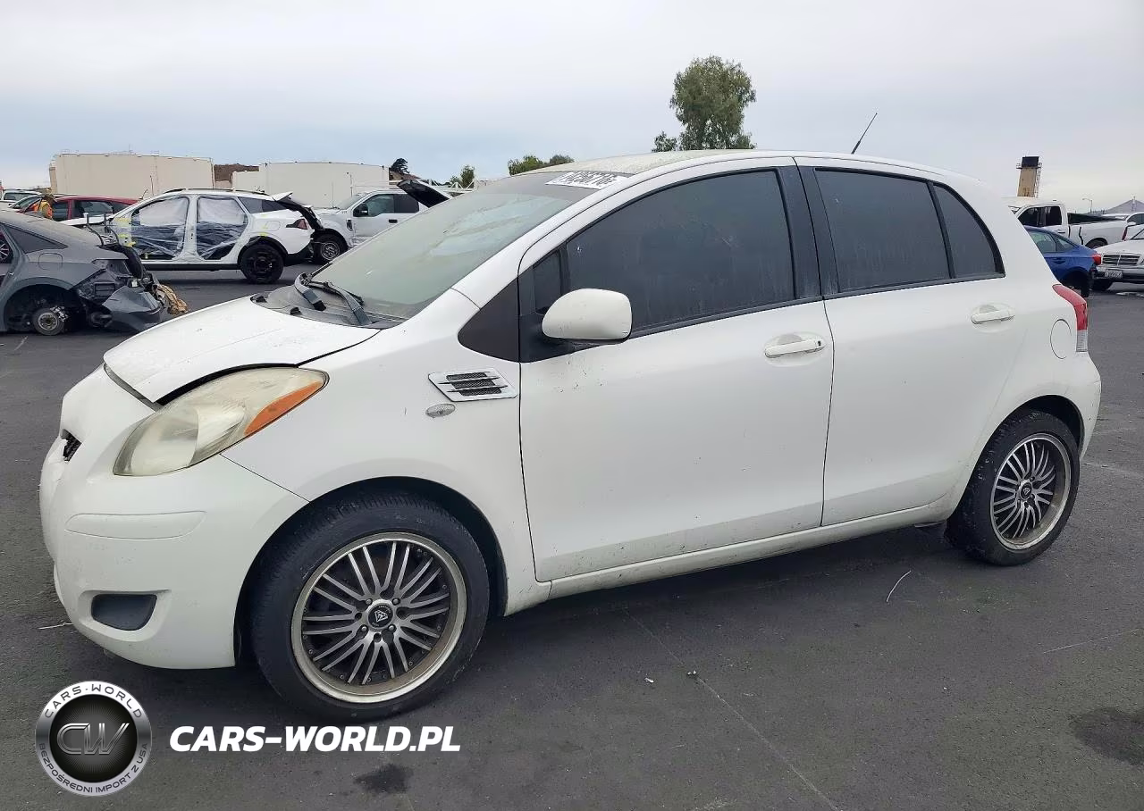 2009 Toyota Yaris Base VIN:JTDKT903895245059 - 1