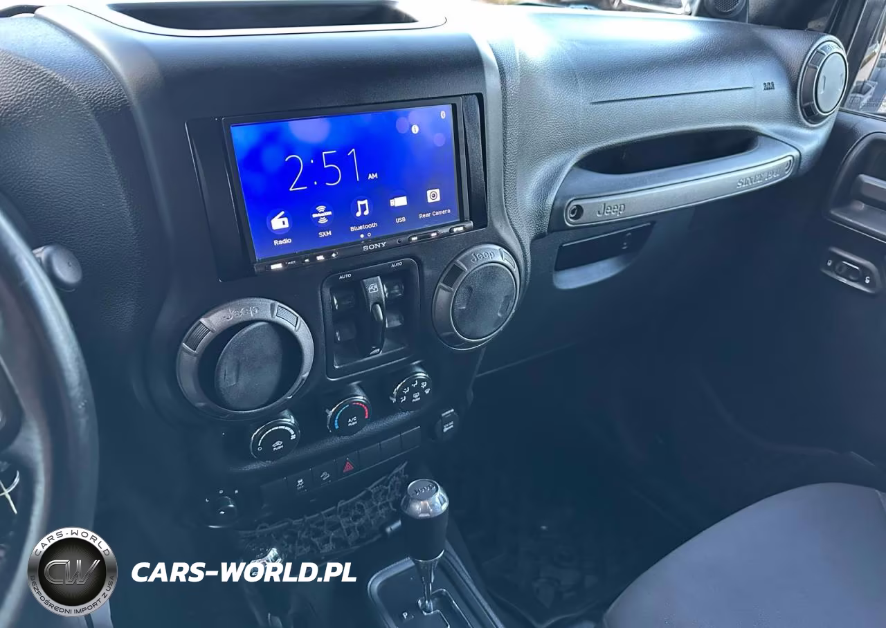 2013 Jeep Wrangler Unlimited Sport VIN:1C4BJWDG5DL589860 - 5