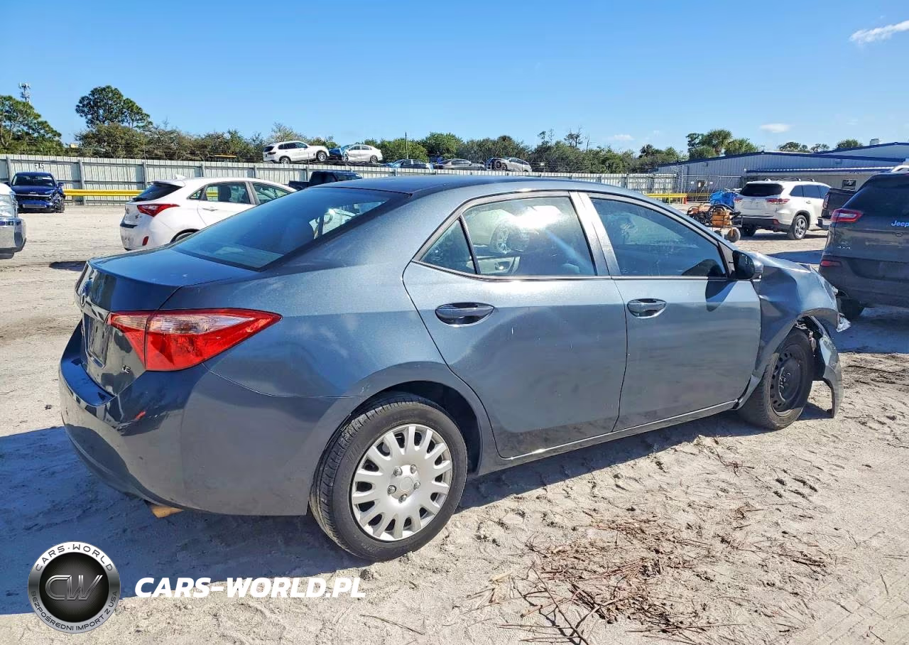 2017 Toyota Corolla L VIN:5YFBURHE3HP702087 - 3