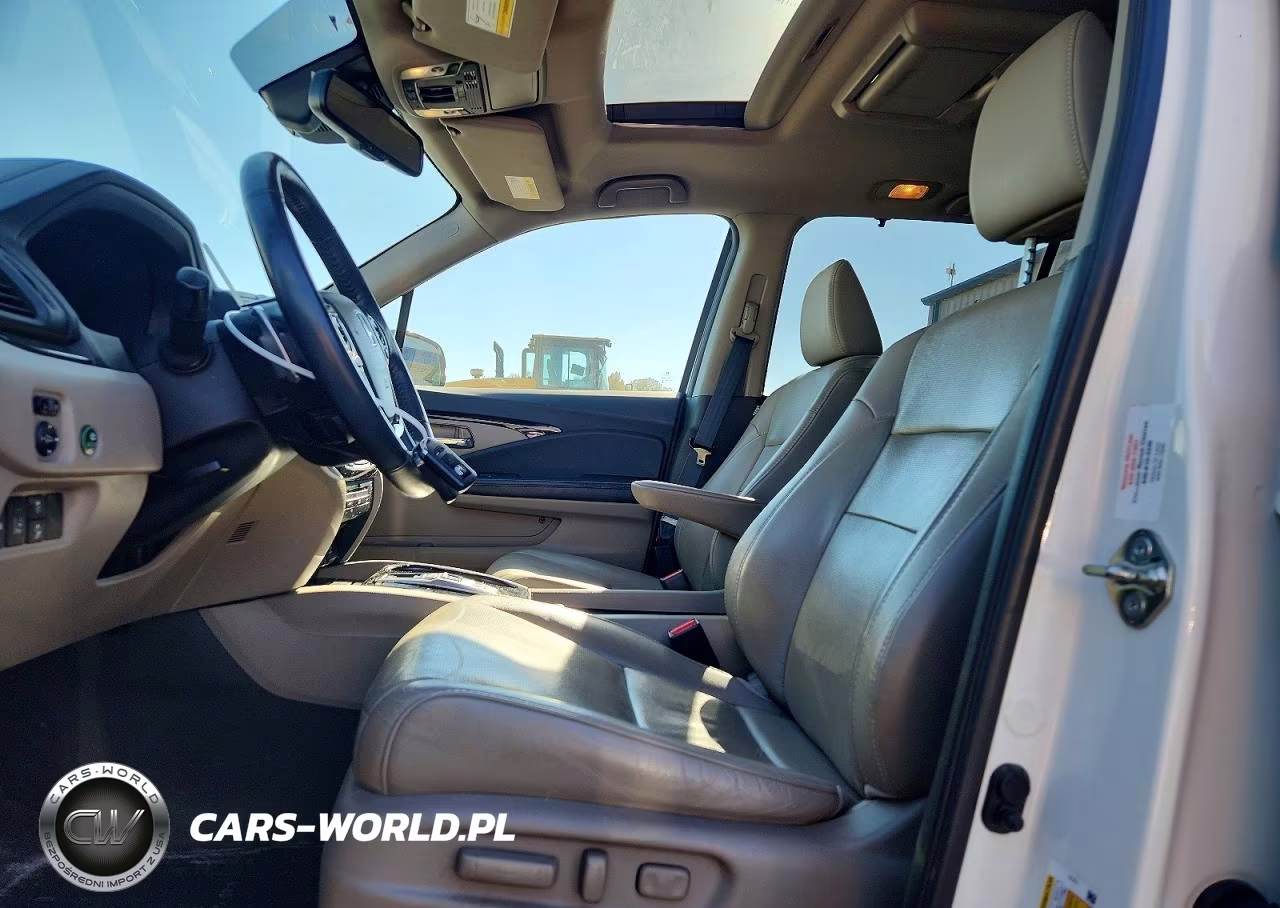 2018 Honda Pilot Elite VIN:5FNYF6H06JB060697 - 7