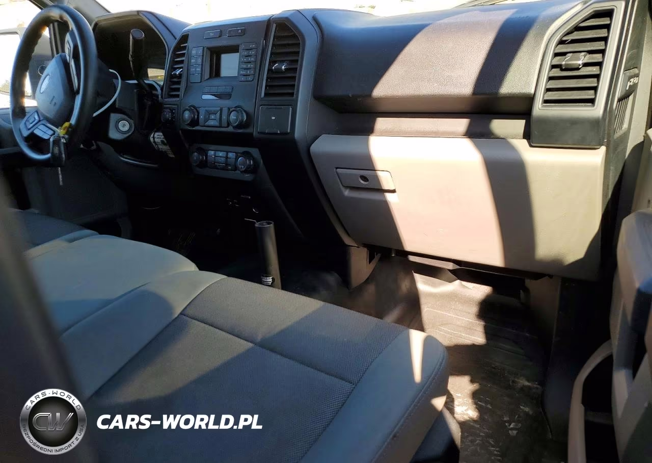 2015 Ford F150 VIN:1FTMF1EP6FFB25876 - 11