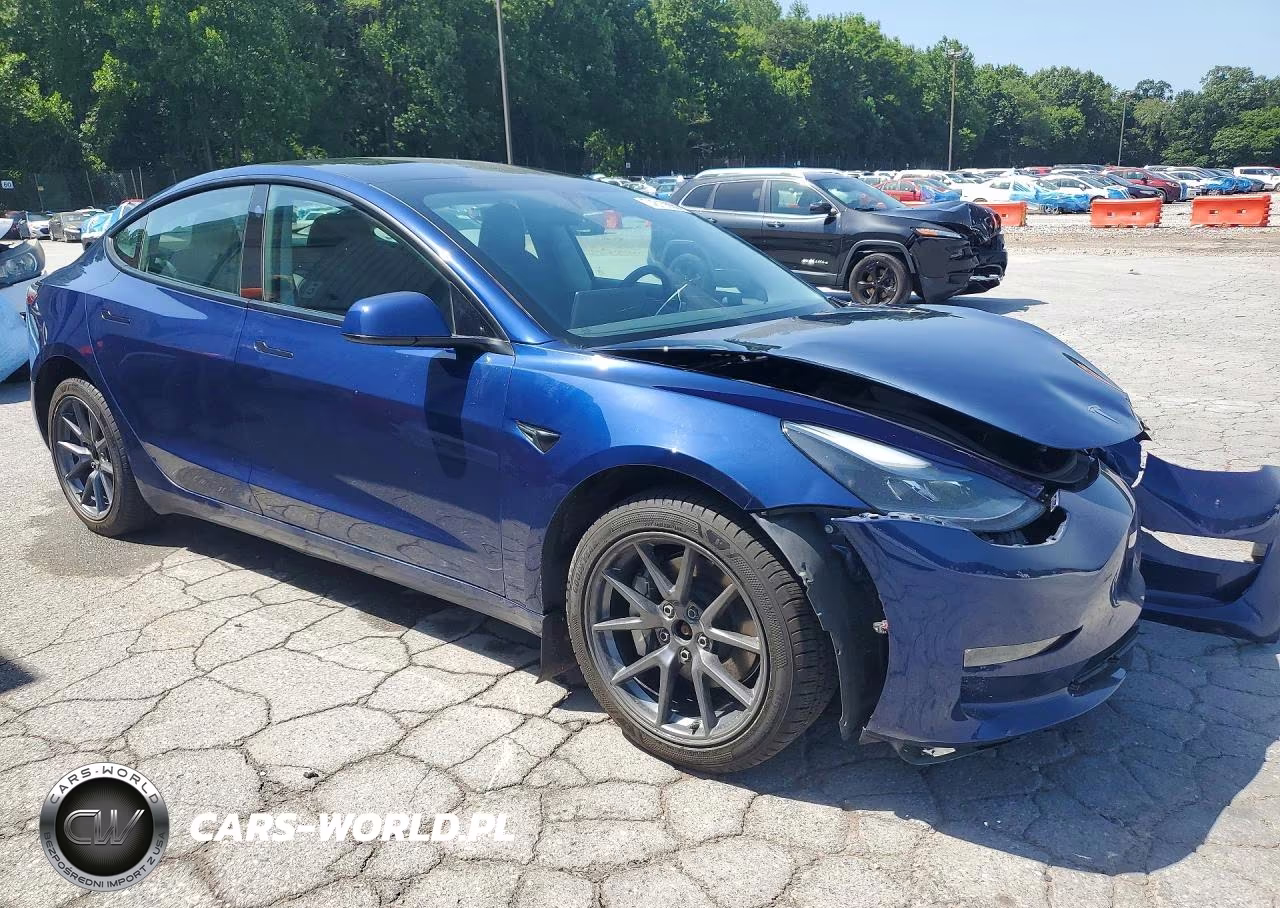 2023 Tesla Model 3 VIN:5YJ3E1EB7PF674429 - 4