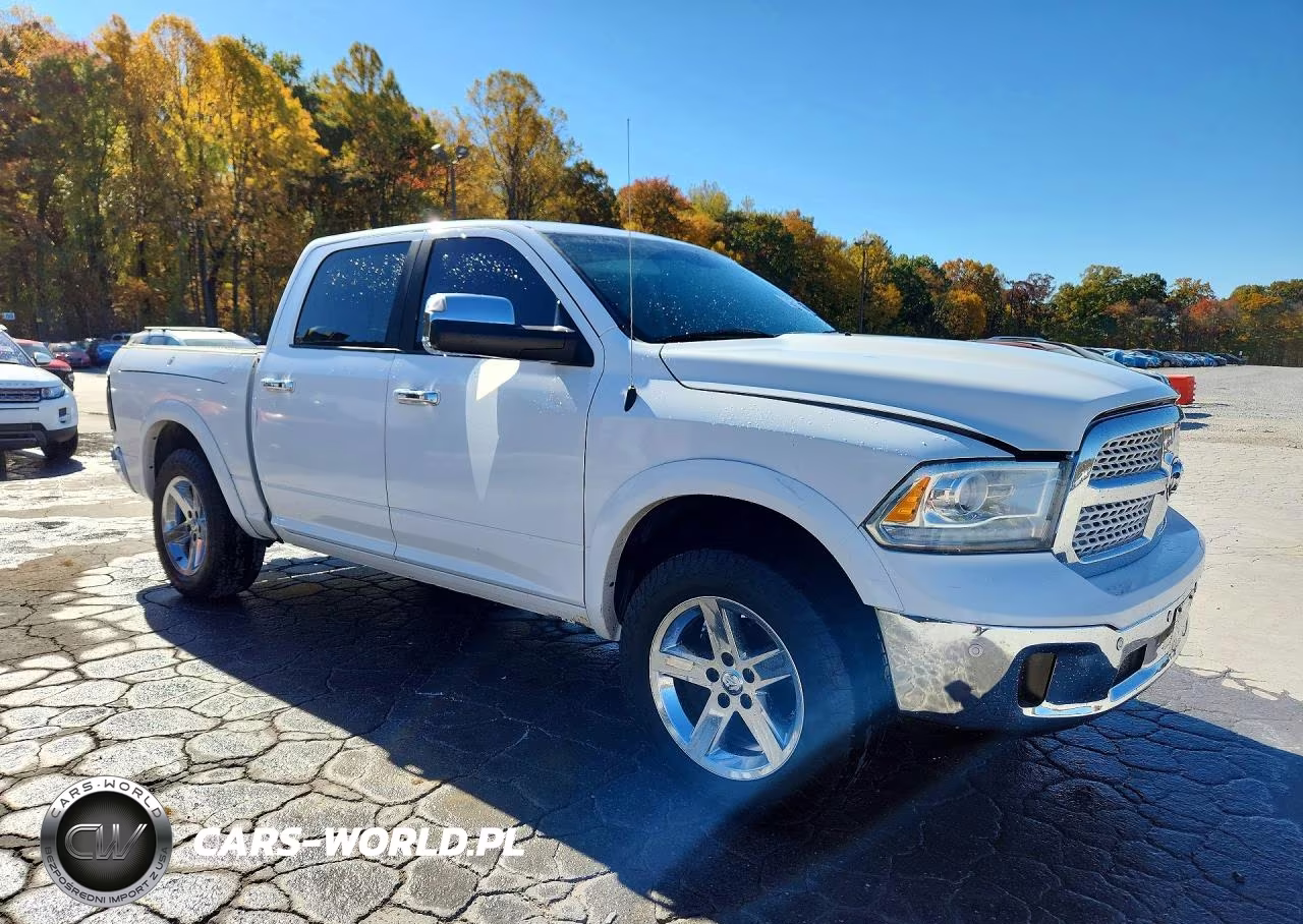 2015 Ram 1500 Laramie VIN:1C6RR7NT7FS512030 - 4