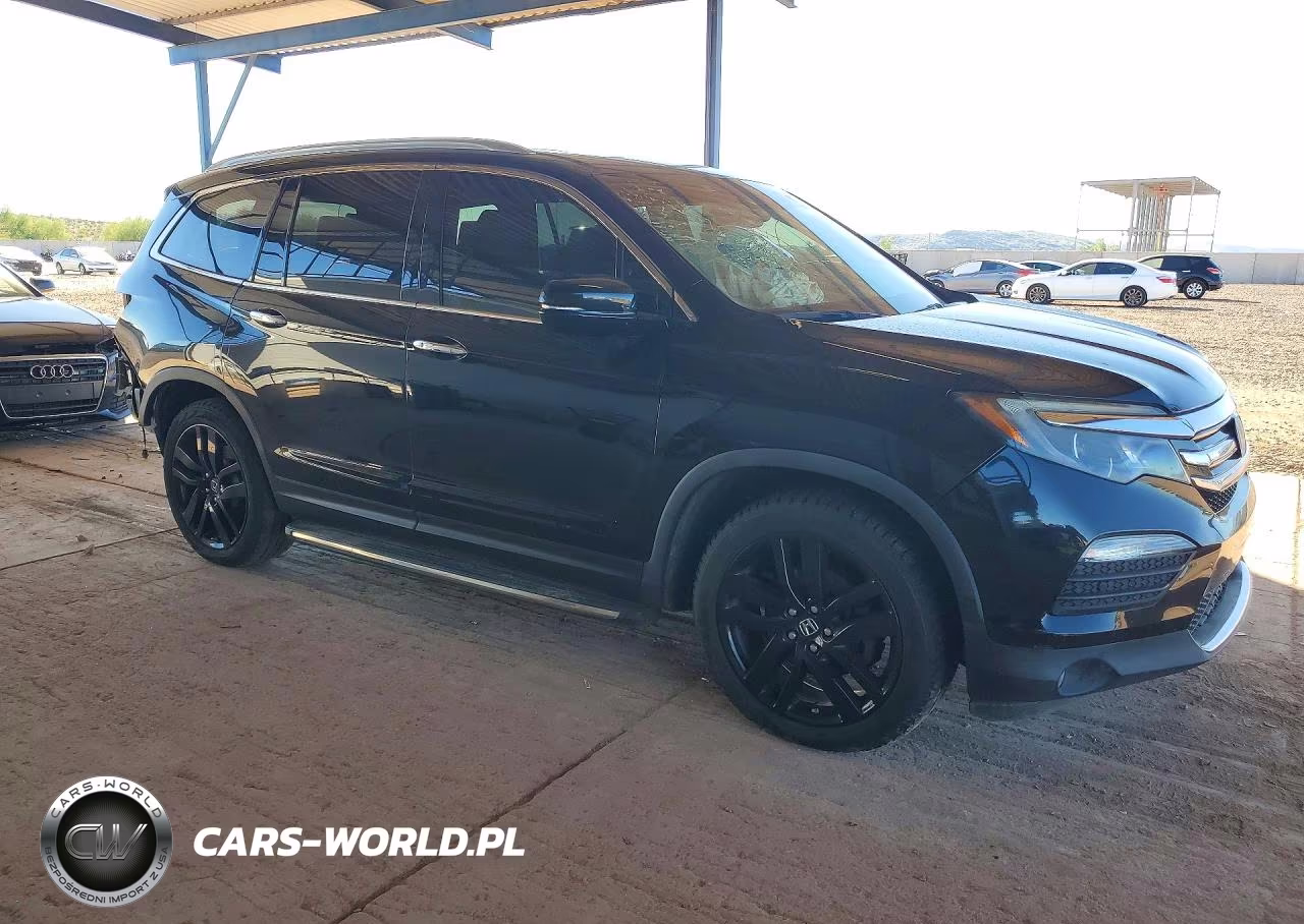 2018 Honda Pilot Elite VIN:5FNYF6H09JB004494 - 4