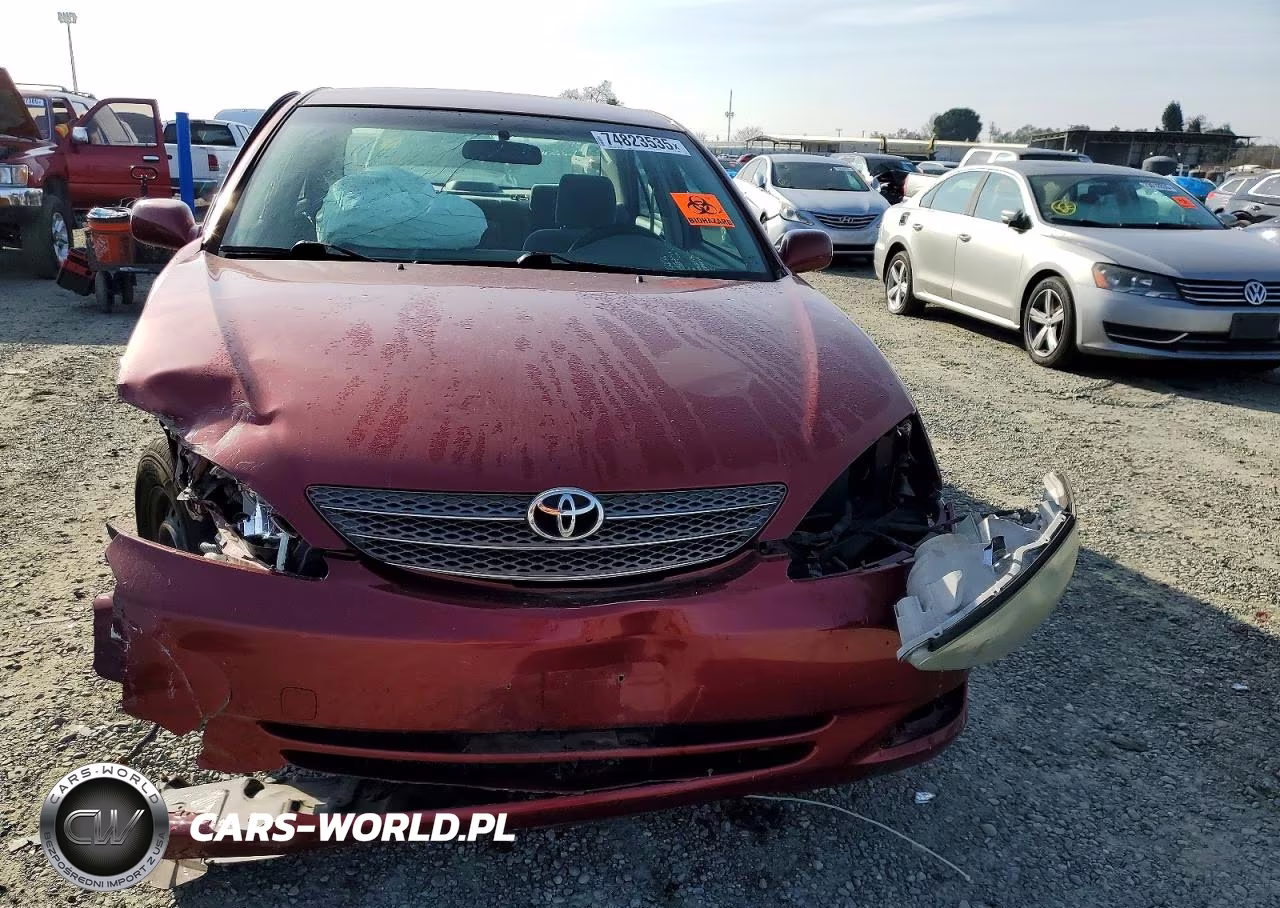 2002 Toyota Camry Le VIN:JTDBE32K720093483 - 5