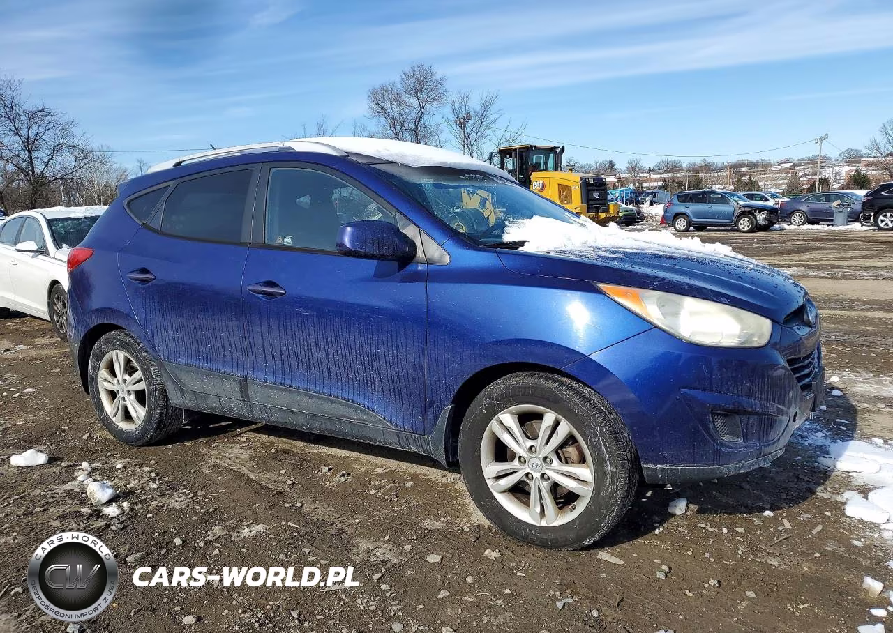 2011 Hyundai Tucson VIN:KM8JUCAC5BU132164 - 4