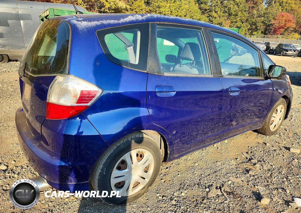 2009 Honda Fit VIN:JHMGE882X9S065247 - 2