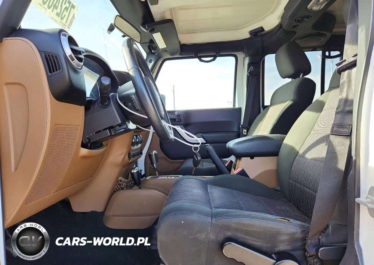 2012 Jeep Wrangler Unlimited Sahara VIN:1C4BJWEG6CL205341 - 7
