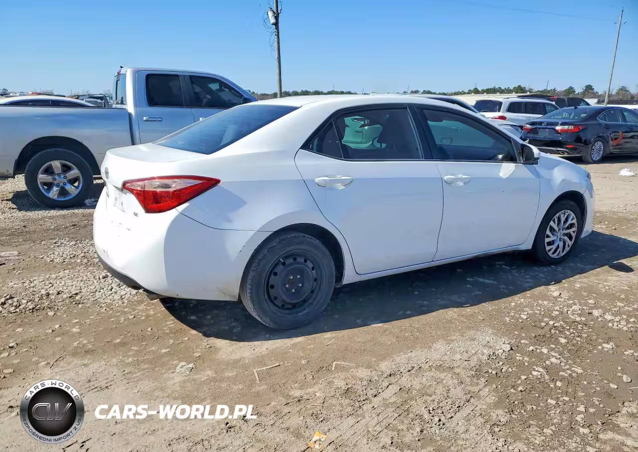 2018 Toyota Corolla L VIN:5YFBURHE0JP770210 - 3