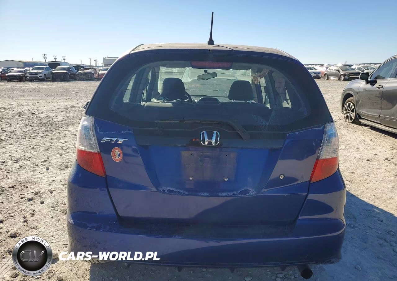 2010 Honda Fit VIN:JHMGE8H25AS008555 - 6